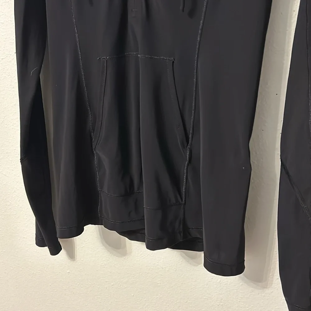 Lululemon Black pullover jacket, black, 1/4 zip. Women’s size 4.